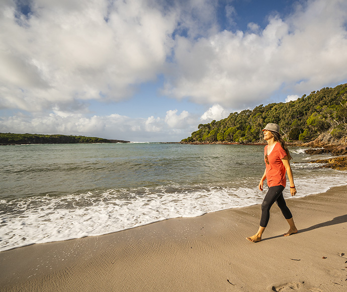 People enjoying the beach, Bittangabee campground, Beowa National Park, formerly known as Ben Boyd National Park